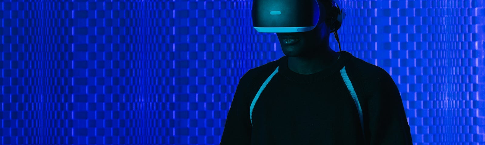 A man who is playing video games in a virtual reality world.
