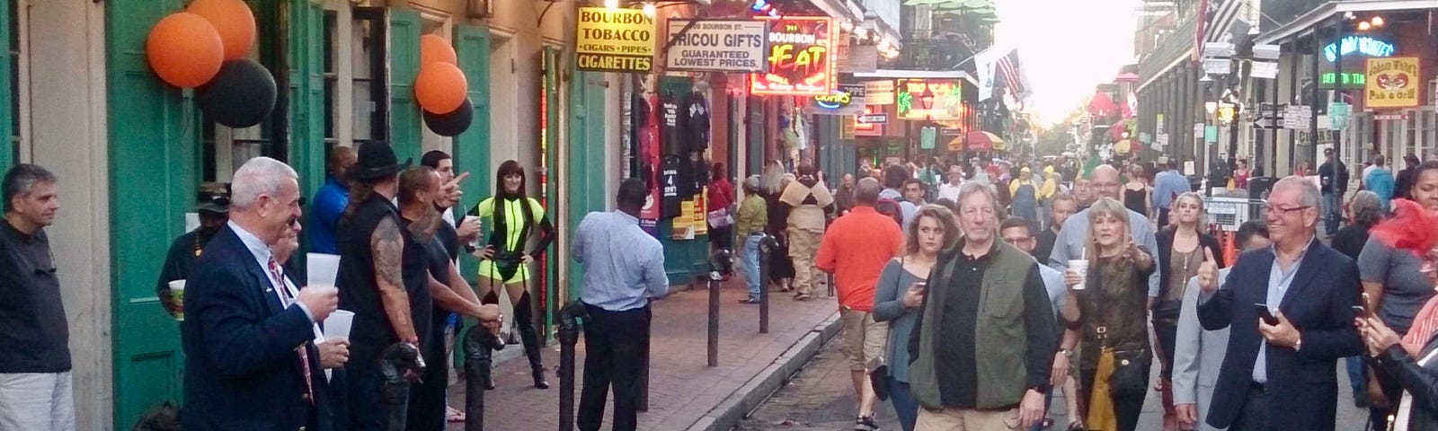 Early evening crowd on Halloween on Bourbon St, New Orleans