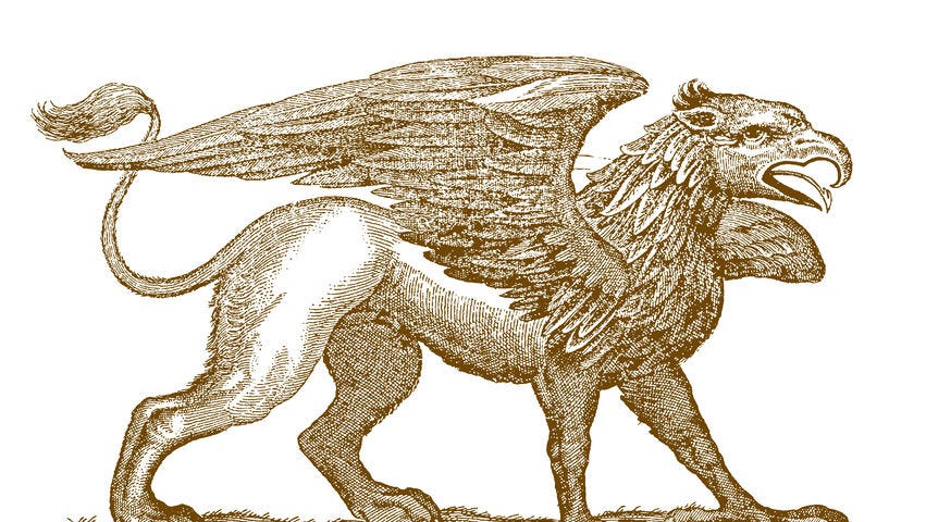 Mythical legendary hybrid creature griffin/gryphon front half of an eagle spreading its wings and the rear half of a lion.