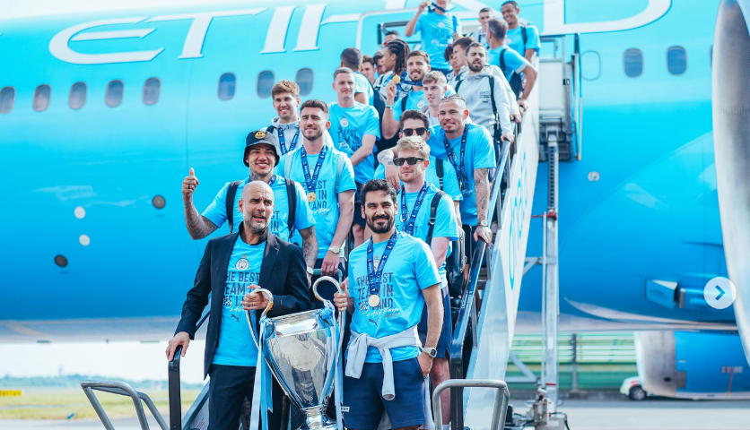 A picture of Manchester City Players after decimating Inter Milan to win the Champions League, and completing their treble-winning-season.