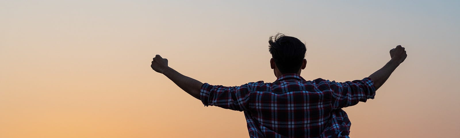 One man watching in the sunset