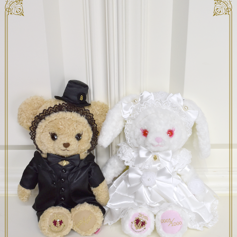 BABY 30th Anniversary Wedding Kumya pochette set. Usakumya wears a wedding dress and Kuma Kumya a top hat and black bow tie.