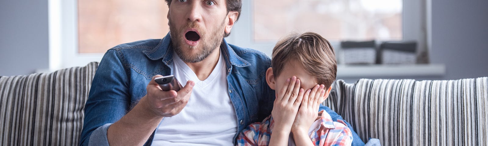 Father and son WATCHING TV