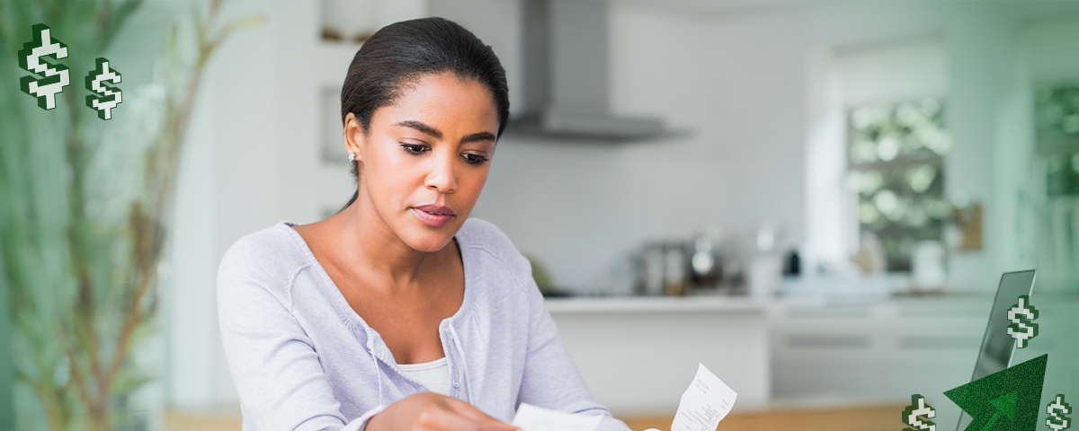 A woman paying the bills. The author is not pictured.