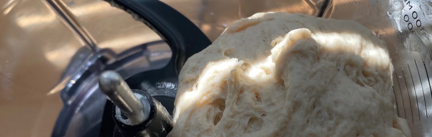 Pizza Dough made in a food processor.