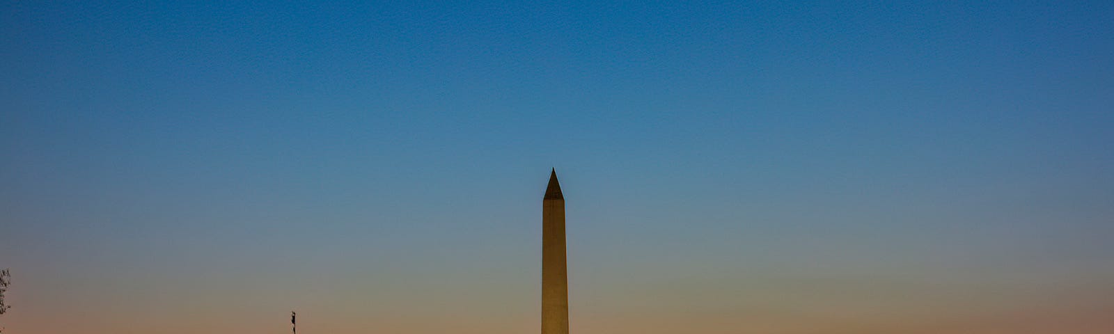 Predawn image of the Washington Monument in DC with lots of ambient color