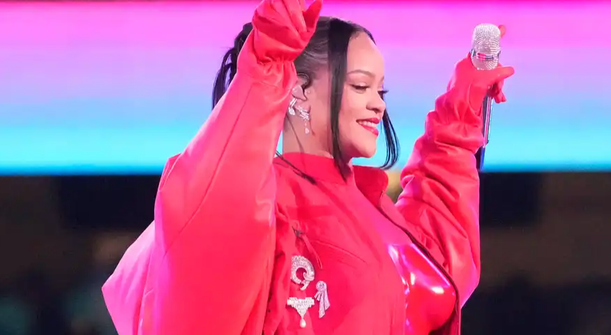 Rihanna smiling at her VLII Super Bowl performance. Photo credit to Michael Chow, The Republic-USA Today Sports.