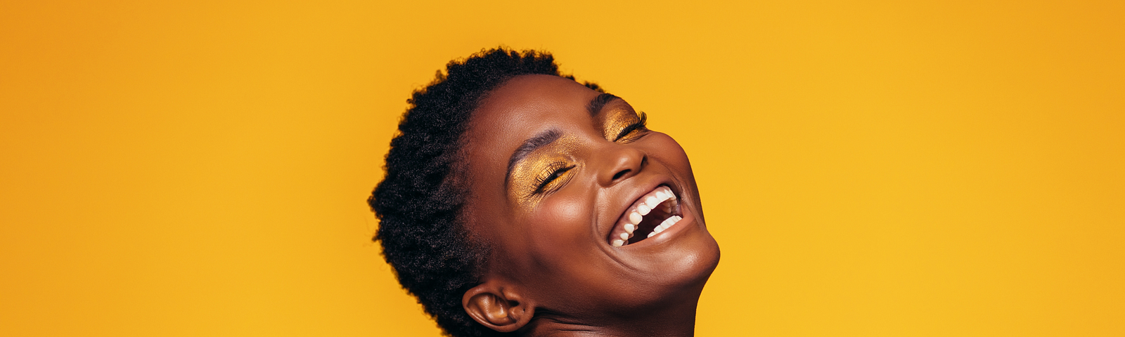 Laughing African female model with makeup