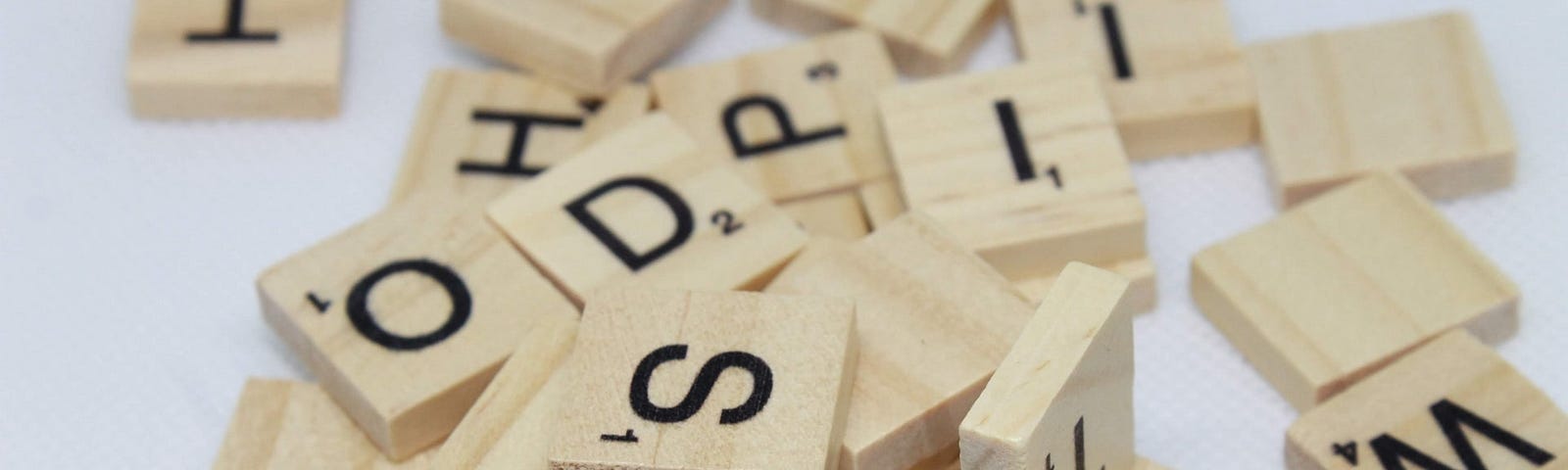 A pile of Scrabble letter tiles