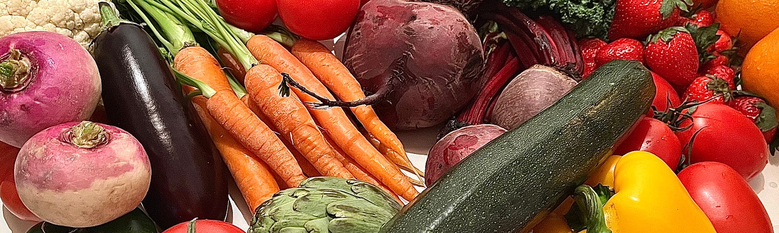 Freshly washed, brightly colored, in-season produce.