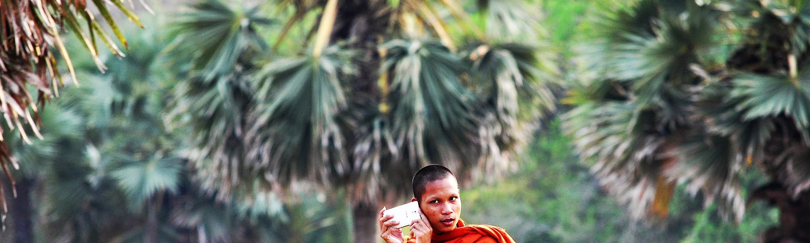 A monk on the phone.