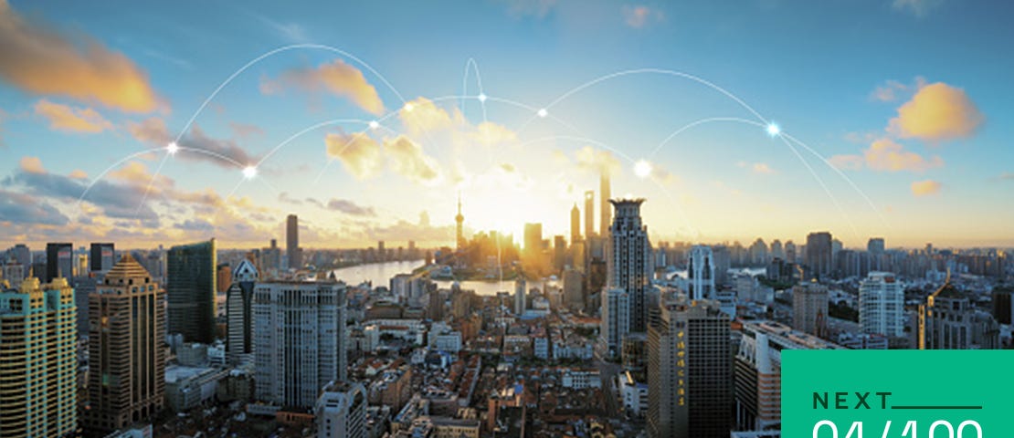 A skyline featuring illustrations of 5G connections through a major city