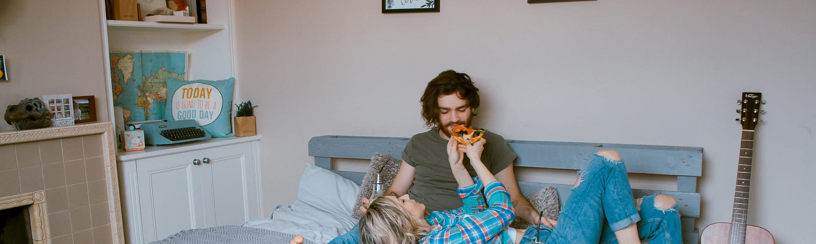 Image of a couple lazing in bed