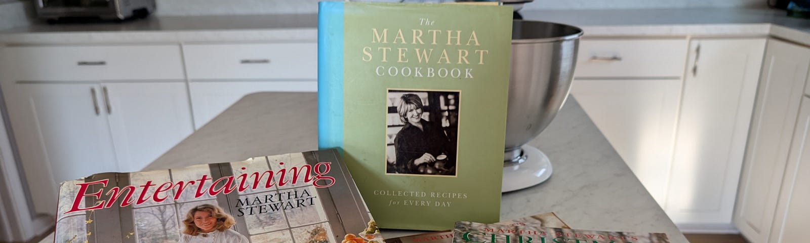 Photo of author’s collection of Martha Stewart cookbooks.