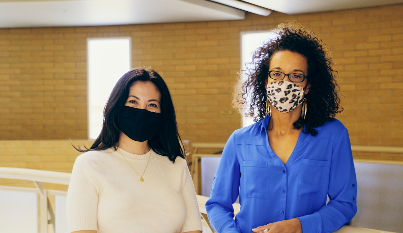 Educators wearing masks look at camera