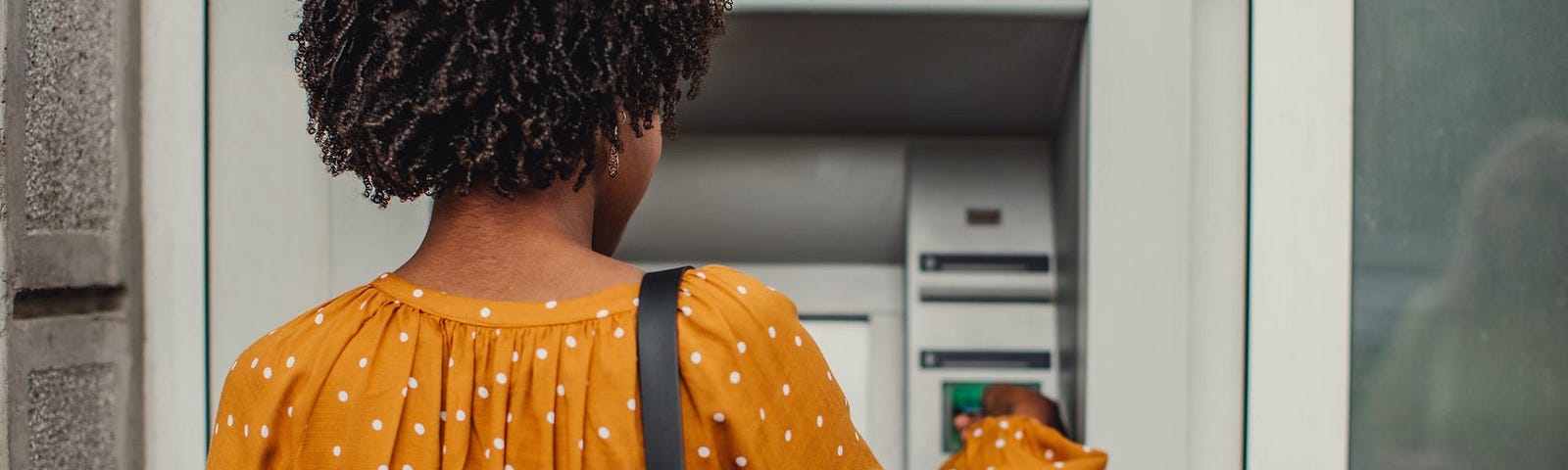 woman using an atm