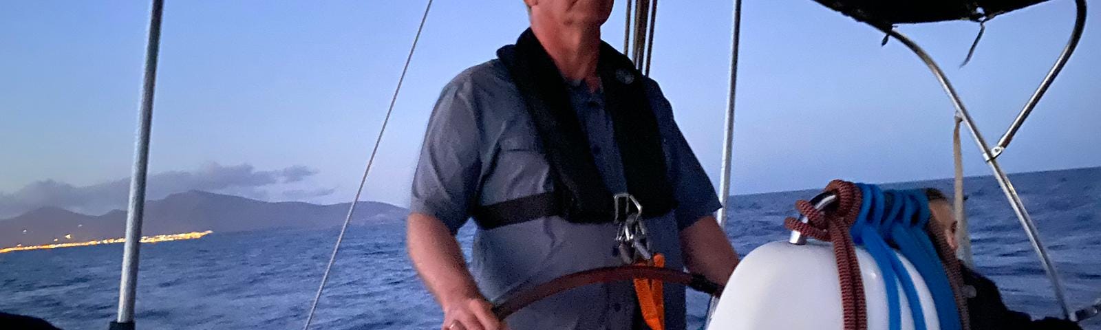 A skipper on a sailing boat