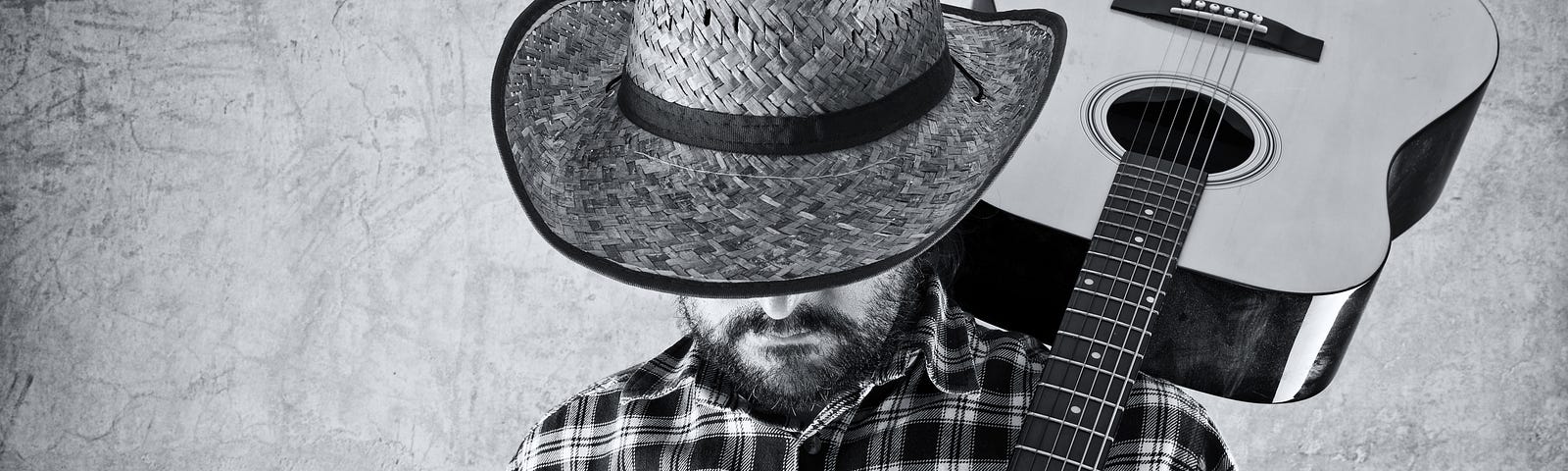 Western country cowboy musician with guitar