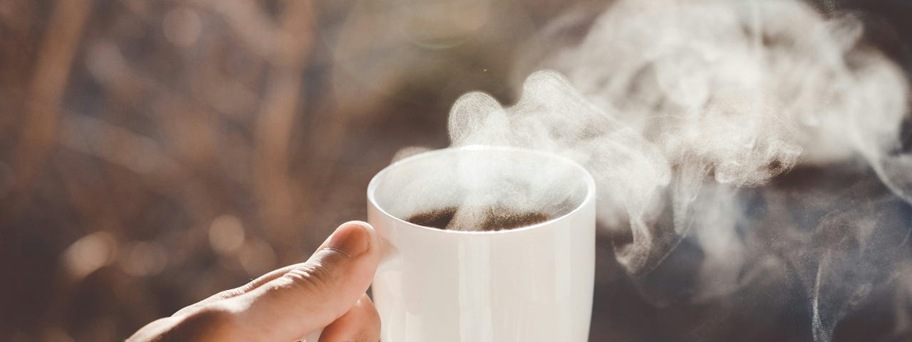 A steaming cup of hot coffee