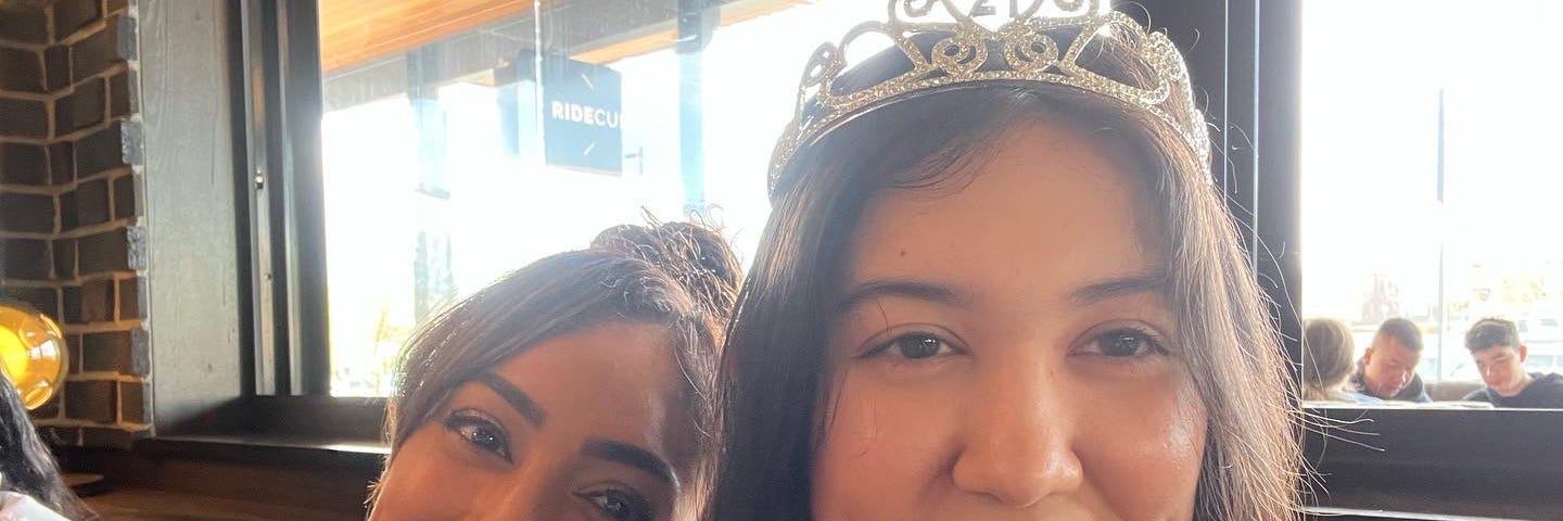 A selfie of Aria Nguyen and her mother Maria Ritchie on Aria’s birthday. Aria is wearing a tiara.