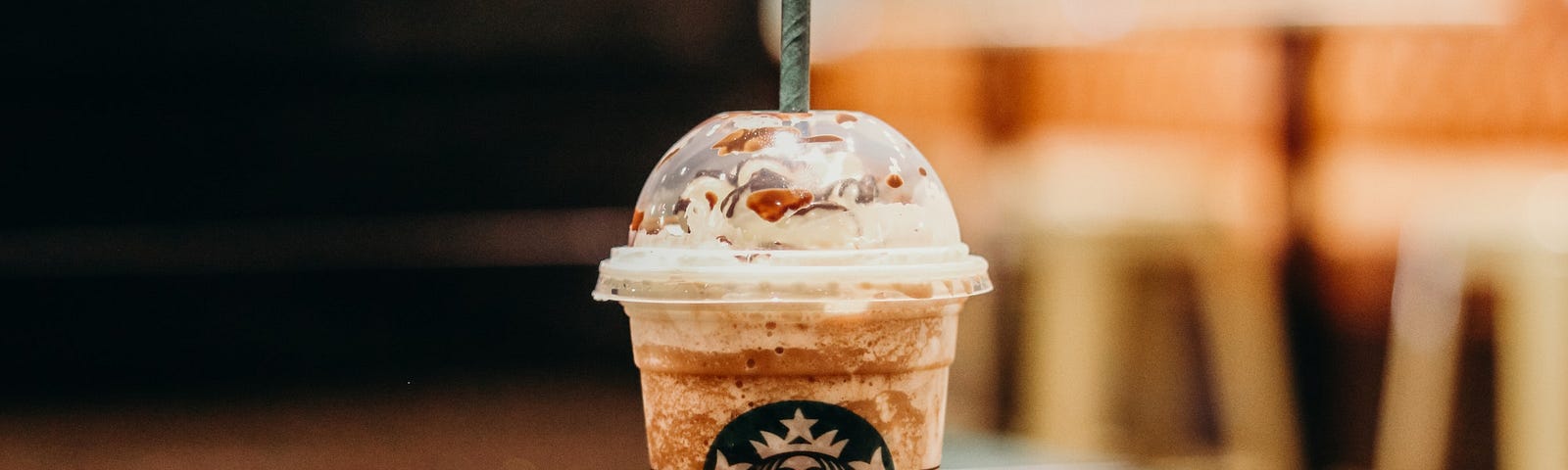 A Starbucks drink sitting on a table