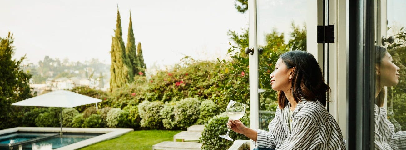 An individual sitting outside.