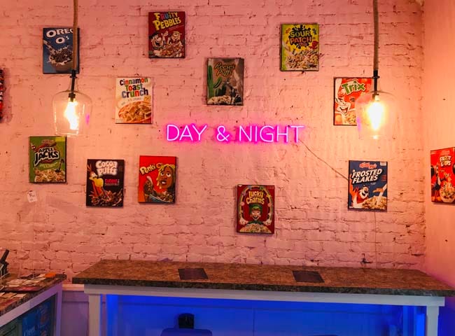 Author’s own photo of a wall inside Charlotte’s Day & Night Cereal Bar.