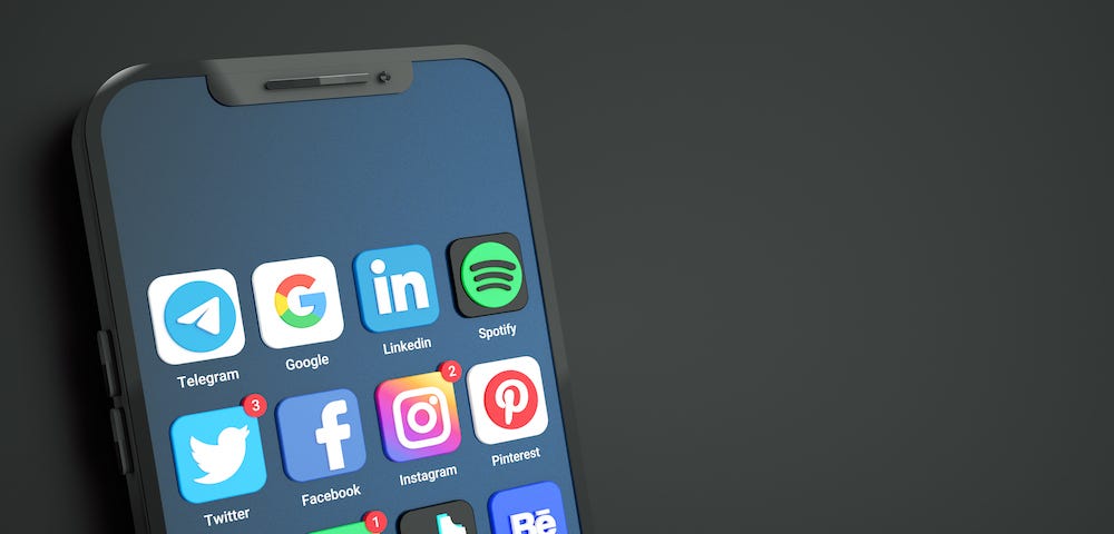 Most popular social media icons and logos on mobile phone screen with copy space for text — by Freepik.com