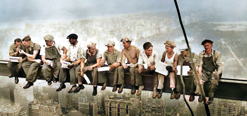 eleven men sitting on a beam above New York City in the photograph “Lunch Atop a Skyscraper”