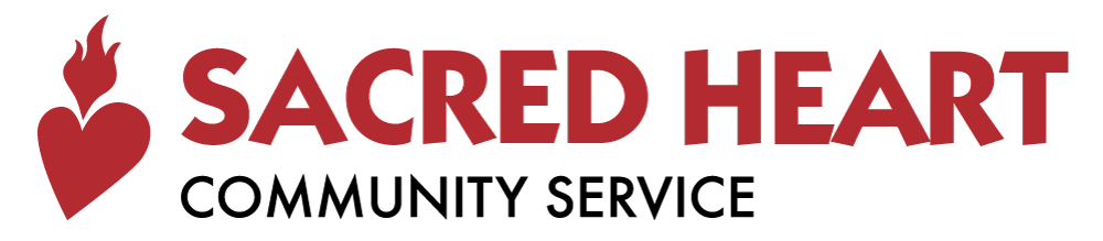 An organization logo: A stylized red heart and flame are next to the words “Sacred Heart,” which are in big red letters above the words “Community Service,” which are in smaller black letters.