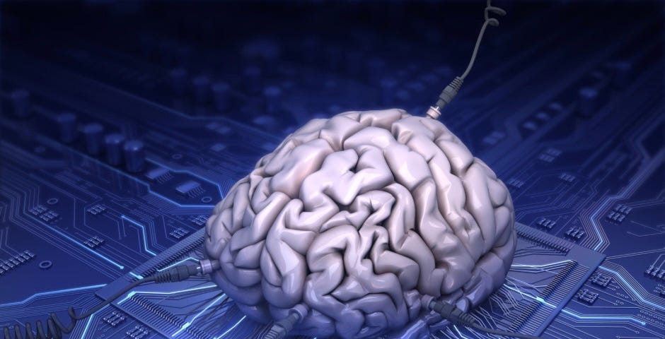 An image of a brain connected to a large circuit board.