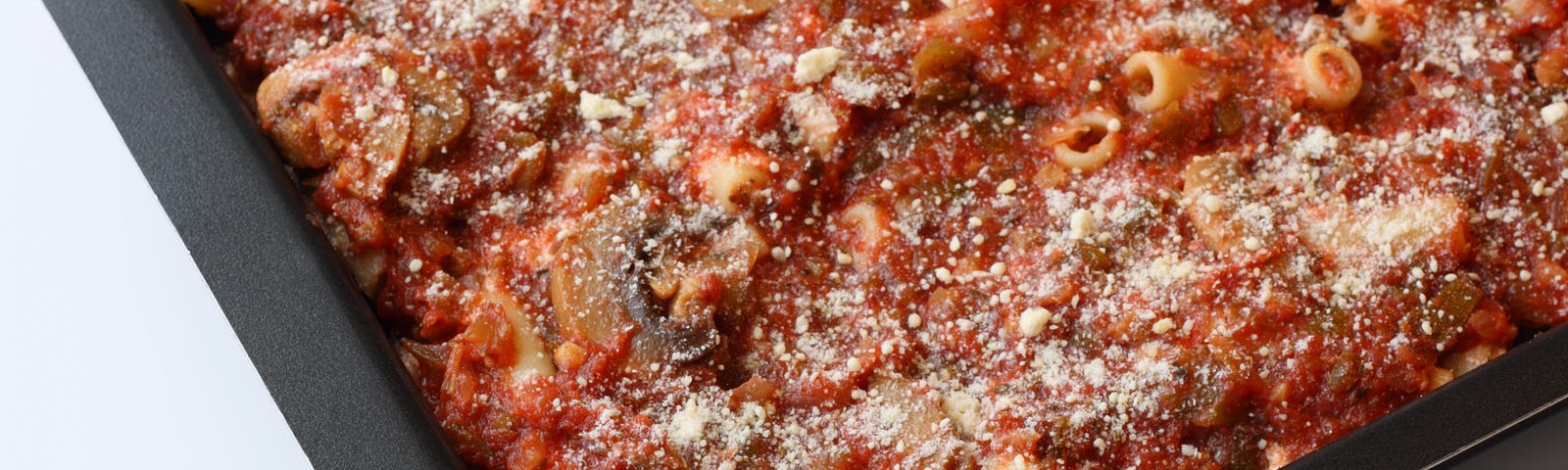 Baked ziti with mushrooms in the pan