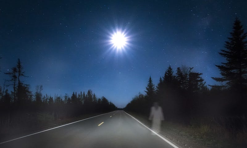 A shadow of white at night along the side of the road; it’s said to be the Ghost of Haynesville Woods.