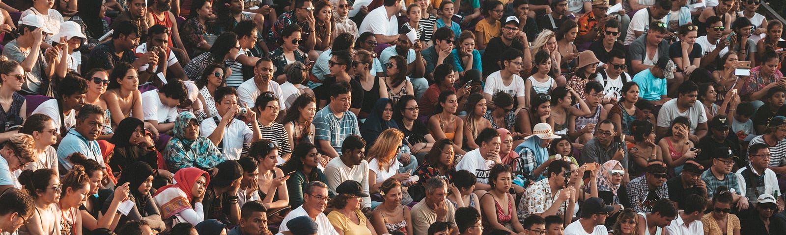 A crowd of people cheering.