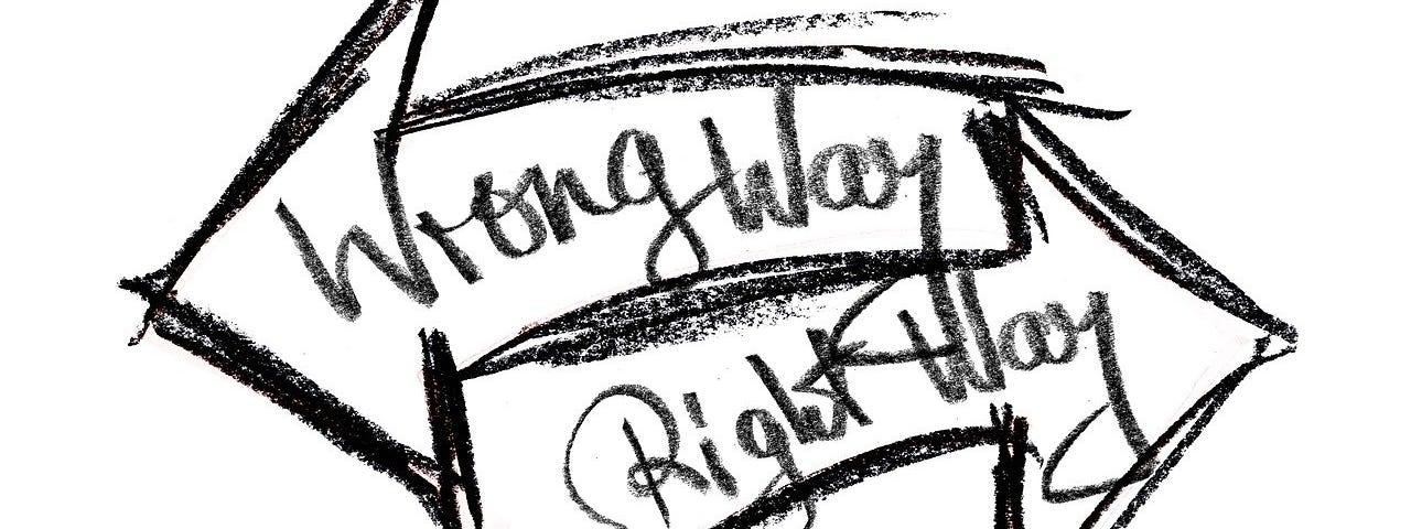 IMAGE: Two opposed arrows drawn in pencil with the words “right way” and “wrong way”