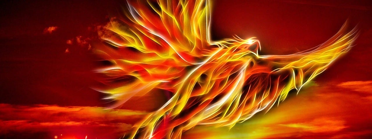 A ohoenix in brillian yellow, orange and red flames.