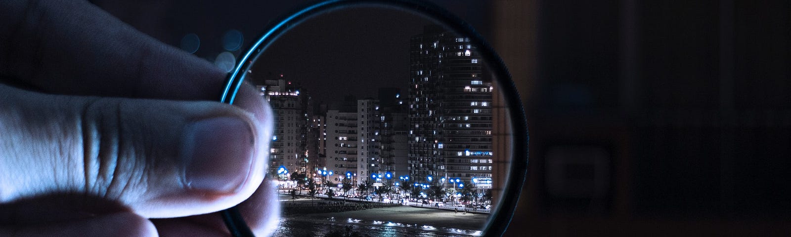 Someone is looking at the city through a magnifying glass