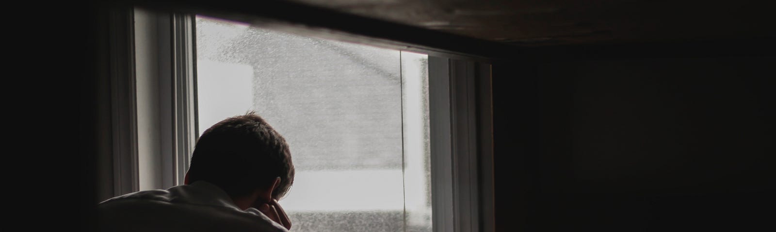 Person waiting by the window