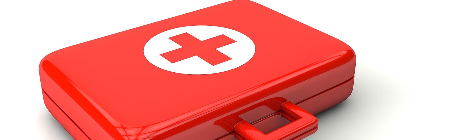 First aid kit in red briefcase