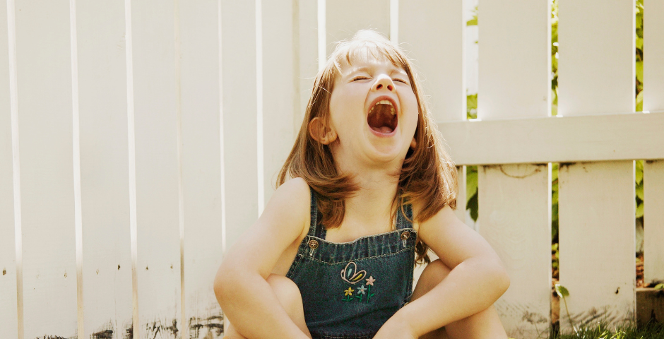 How to better deal with tantrums. Young girl crying with anger