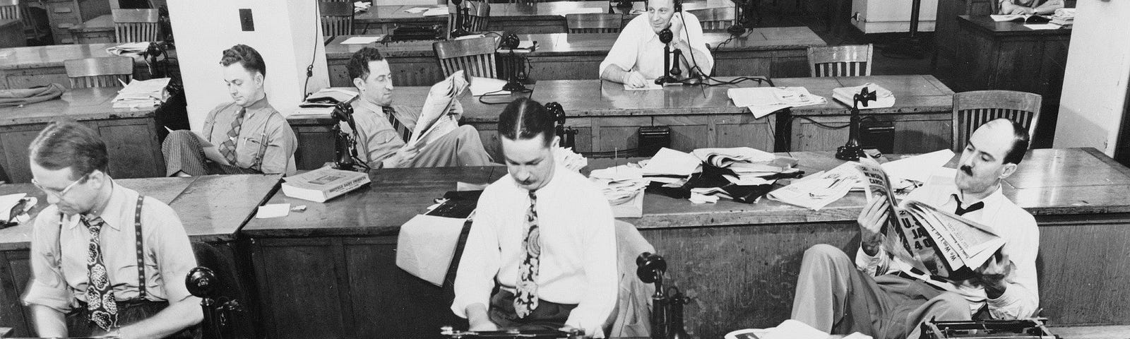 Black and white image of vintage newsroom