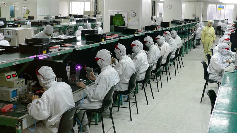 Workers in an electronic components factory in Shenzhen