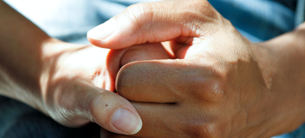 two people holding hands