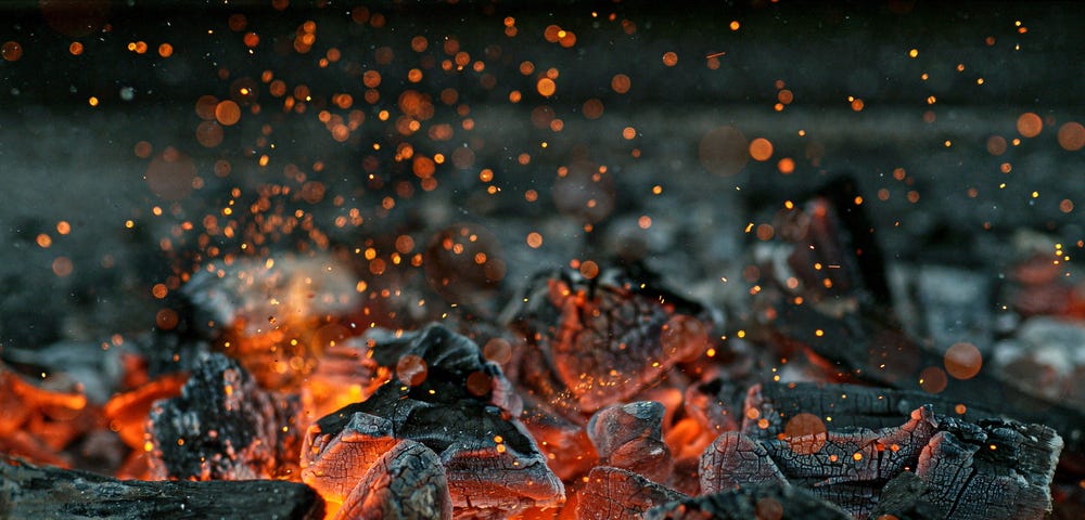 Picture of red glowing, burning charcoal; note: while charcoal is made of wood and does not contain yttrium, the picture nevertheless nicely represents the content of the article.