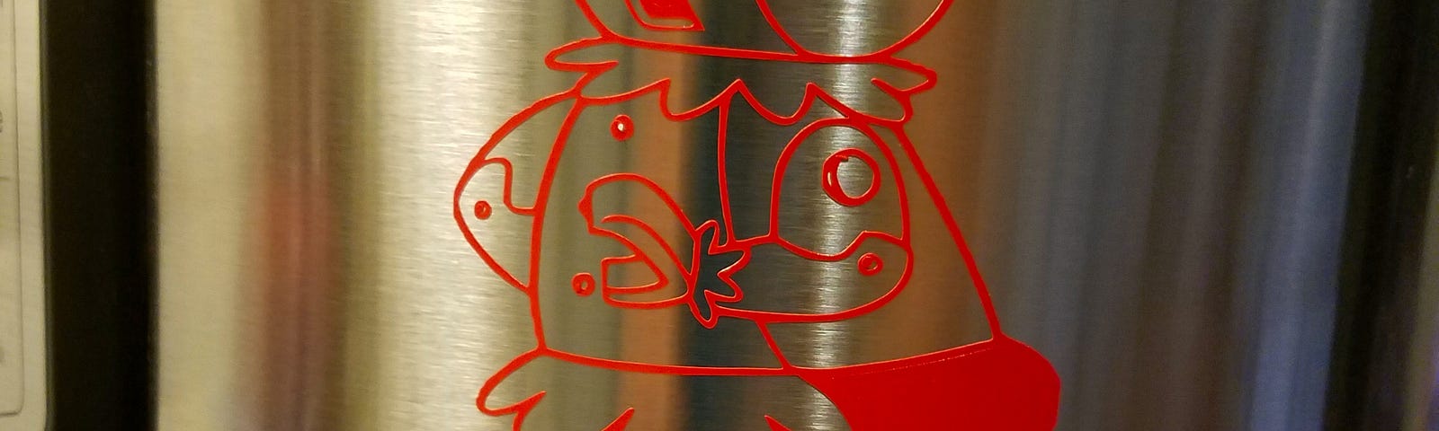 A red decal of Rosie the Robot from the animated series “The Jetsons” is prominently displayed on the side of a stainless steel kitchen appliance. Below the decal, the name “Rosie the Robot” is written in red to match the character’s outline.