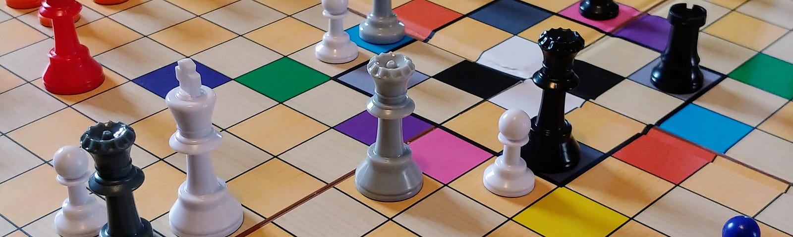 The White King checkmated by a Slate Queen and surrounded by Cyan, Ash, and Black Queens.