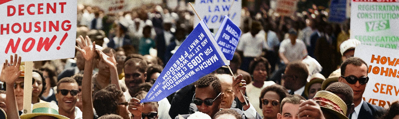 Civil Rights March on Washington, D.C. [Leaders of the march leading marchers down the street.]