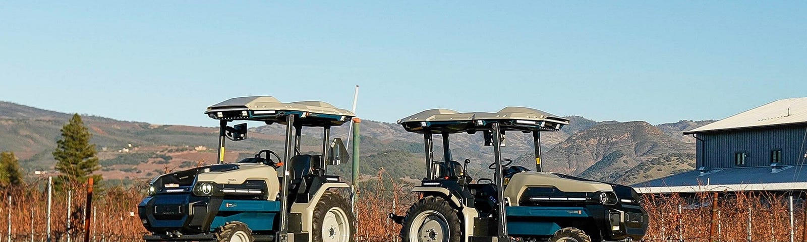 A view of two Monarch MK-V electric tractors reinforced with AI and additional autonomous capabilities.