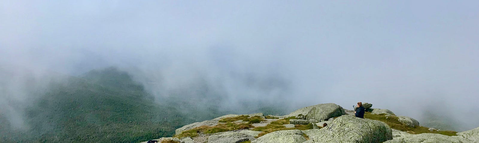 View from mountaintop mostly shrouded in clouds