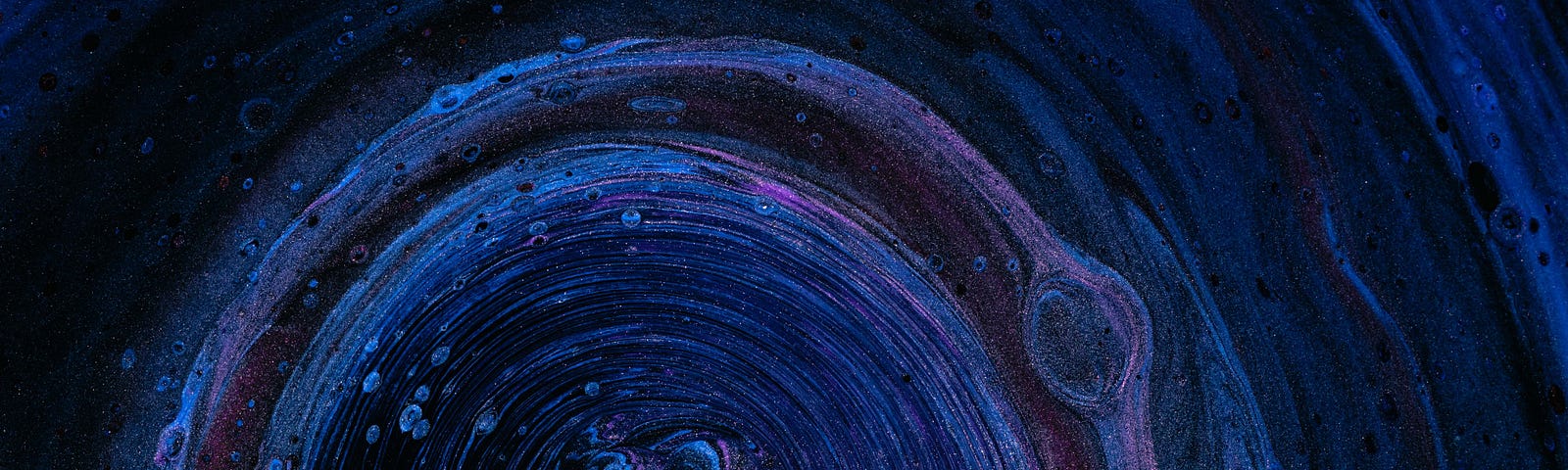 Abstract blue and purple and black swirl pattern. Working Loki’s Telescope by Jim Latham